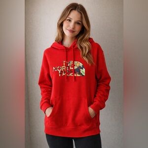 The North Face red hoodie